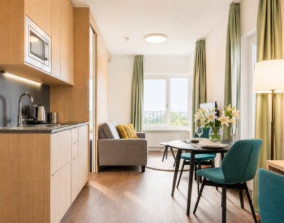 Modern 2-Room Apartment with Stunning Views in Central Berlin Mitte | Fitness, Concierge & Co-Working Amenities